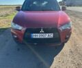 Міцубісі Аутлендер 2011 у Чорноморську (Іллічівську) на Automoto.ua Червоний Міцубісі Аутлендер, об'ємом двигуна 3 л та пробігом 200 тис. км за 11000 $, фото 5 на Automoto.ua