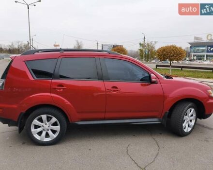 Красный Мицубиси Аутлендер, объемом двигателя 2.36 л и пробегом 93 тыс. км за 11499 $, фото 4 на Automoto.ua