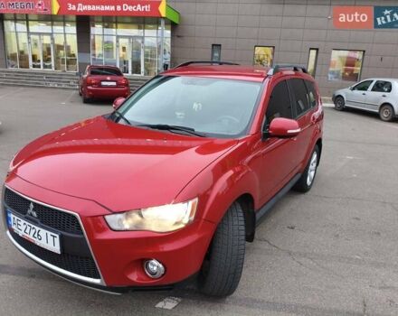 Красный Мицубиси Аутлендер, объемом двигателя 2.36 л и пробегом 93 тыс. км за 11499 $, фото 2 на Automoto.ua