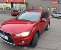 Красный Мицубиси Аутлендер, объемом двигателя 2.36 л и пробегом 93 тыс. км за 11499 $, фото 2 на Automoto.ua