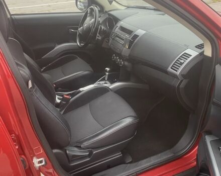 Красный Мицубиси Аутлендер, объемом двигателя 2.4 л и пробегом 210 тыс. км за 11800 $, фото 17 на Automoto.ua