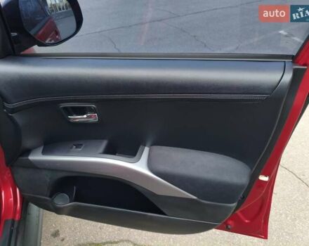 Красный Мицубиси Аутлендер, объемом двигателя 2.36 л и пробегом 93 тыс. км за 11499 $, фото 25 на Automoto.ua