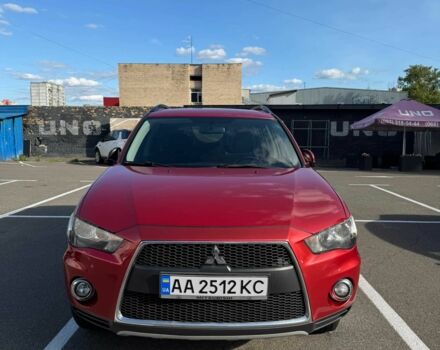 Красный Мицубиси Аутлендер, объемом двигателя 2 л и пробегом 269 тыс. км за 8700 $, фото 1 на Automoto.ua