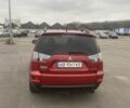 Красный Мицубиси Аутлендер, объемом двигателя 2.4 л и пробегом 210 тыс. км за 11800 $, фото 14 на Automoto.ua