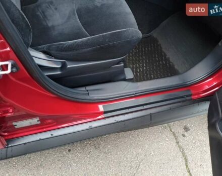 Красный Мицубиси Аутлендер, объемом двигателя 2.36 л и пробегом 93 тыс. км за 11499 $, фото 26 на Automoto.ua