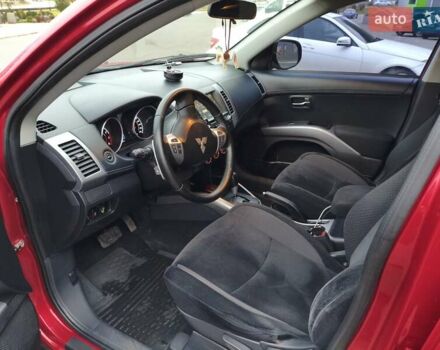 Красный Мицубиси Аутлендер, объемом двигателя 2.36 л и пробегом 93 тыс. км за 11499 $, фото 18 на Automoto.ua