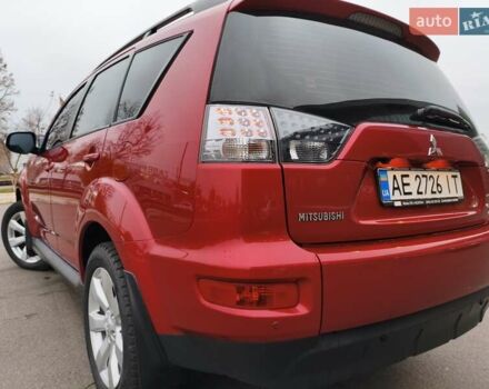 Красный Мицубиси Аутлендер, объемом двигателя 2.36 л и пробегом 93 тыс. км за 11499 $, фото 11 на Automoto.ua