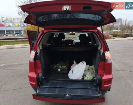 Красный Мицубиси Аутлендер, объемом двигателя 2.36 л и пробегом 93 тыс. км за 11499 $, фото 16 на Automoto.ua