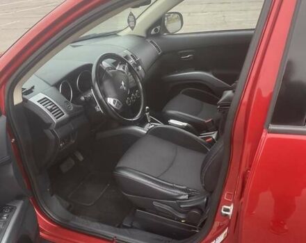 Красный Мицубиси Аутлендер, объемом двигателя 2.36 л и пробегом 210 тыс. км за 11800 $, фото 10 на Automoto.ua