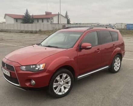 Красный Мицубиси Аутлендер, объемом двигателя 2.36 л и пробегом 210 тыс. км за 11800 $, фото 2 на Automoto.ua