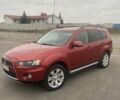 Красный Мицубиси Аутлендер, объемом двигателя 2.36 л и пробегом 210 тыс. км за 11800 $, фото 2 на Automoto.ua