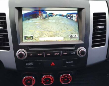 Красный Мицубиси Аутлендер, объемом двигателя 2.36 л и пробегом 93 тыс. км за 11499 $, фото 32 на Automoto.ua