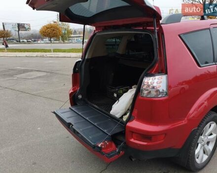 Красный Мицубиси Аутлендер, объемом двигателя 2.36 л и пробегом 93 тыс. км за 11499 $, фото 14 на Automoto.ua