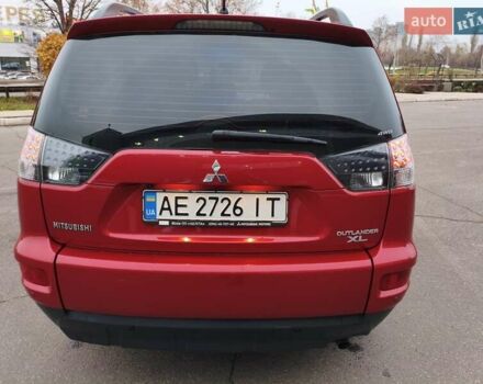 Красный Мицубиси Аутлендер, объемом двигателя 2.36 л и пробегом 93 тыс. км за 11499 $, фото 8 на Automoto.ua