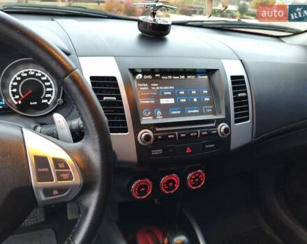 Красный Мицубиси Аутлендер, объемом двигателя 2.36 л и пробегом 93 тыс. км за 11499 $, фото 31 на Automoto.ua