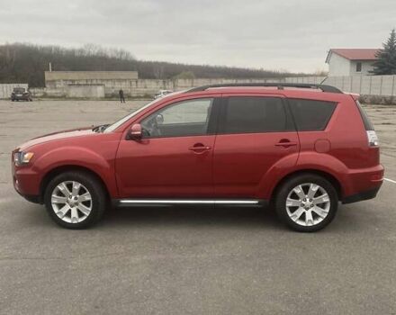 Красный Мицубиси Аутлендер, объемом двигателя 2.36 л и пробегом 210 тыс. км за 11800 $, фото 3 на Automoto.ua