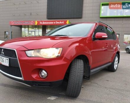 Красный Мицубиси Аутлендер, объемом двигателя 2.36 л и пробегом 93 тыс. км за 11499 $, фото 3 на Automoto.ua