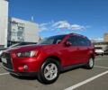 Красный Мицубиси Аутлендер, объемом двигателя 2 л и пробегом 269 тыс. км за 8700 $, фото 1 на Automoto.ua