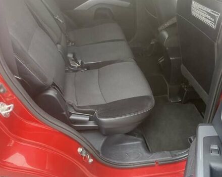 Красный Мицубиси Аутлендер, объемом двигателя 2.36 л и пробегом 210 тыс. км за 11800 $, фото 7 на Automoto.ua