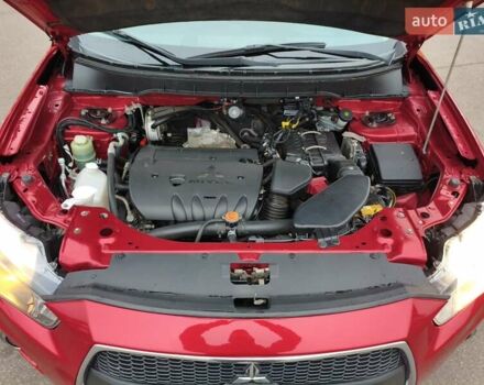Красный Мицубиси Аутлендер, объемом двигателя 2.36 л и пробегом 93 тыс. км за 11499 $, фото 36 на Automoto.ua