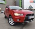 Красный Мицубиси Аутлендер, объемом двигателя 2.36 л и пробегом 93 тыс. км за 11499 $, фото 1 на Automoto.ua