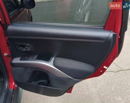 Красный Мицубиси Аутлендер, объемом двигателя 2.36 л и пробегом 93 тыс. км за 11499 $, фото 22 на Automoto.ua