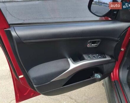 Красный Мицубиси Аутлендер, объемом двигателя 2.36 л и пробегом 93 тыс. км за 11499 $, фото 17 на Automoto.ua