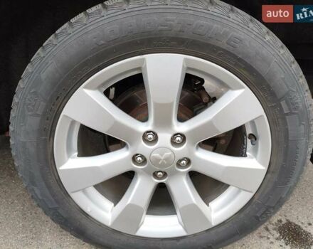 Красный Мицубиси Аутлендер, объемом двигателя 2.36 л и пробегом 93 тыс. км за 11499 $, фото 33 на Automoto.ua