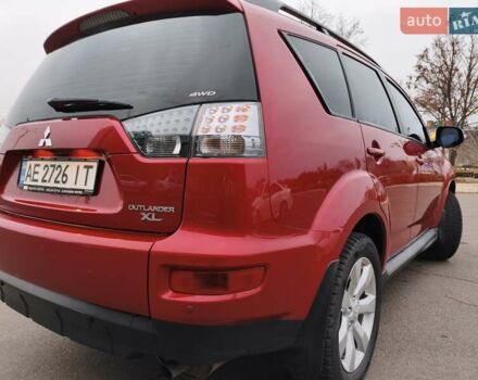 Красный Мицубиси Аутлендер, объемом двигателя 2.36 л и пробегом 93 тыс. км за 11499 $, фото 7 на Automoto.ua
