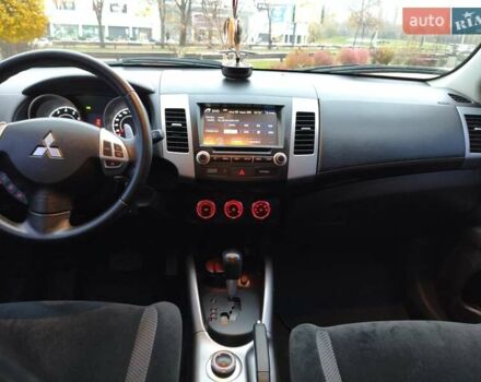 Красный Мицубиси Аутлендер, объемом двигателя 2.36 л и пробегом 93 тыс. км за 11499 $, фото 40 на Automoto.ua