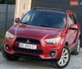 Червоний Міцубісі Аутлендер, об'ємом двигуна 2 л та пробігом 185 тис. км за 13500 $, фото 1 на Automoto.ua