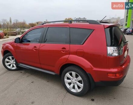 Красный Мицубиси Аутлендер, объемом двигателя 2.36 л и пробегом 93 тыс. км за 11499 $, фото 12 на Automoto.ua