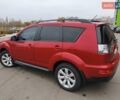 Красный Мицубиси Аутлендер, объемом двигателя 2.36 л и пробегом 93 тыс. км за 11499 $, фото 12 на Automoto.ua