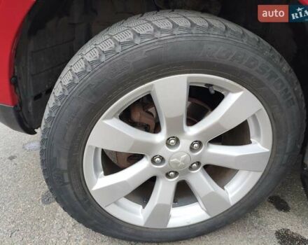 Красный Мицубиси Аутлендер, объемом двигателя 2.36 л и пробегом 93 тыс. км за 11499 $, фото 34 на Automoto.ua