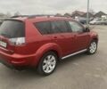 Красный Мицубиси Аутлендер, объемом двигателя 2.36 л и пробегом 210 тыс. км за 11800 $, фото 4 на Automoto.ua