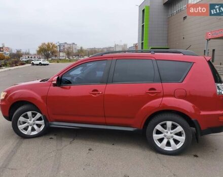 Красный Мицубиси Аутлендер, объемом двигателя 2.36 л и пробегом 93 тыс. км за 11499 $, фото 13 на Automoto.ua