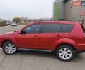 Красный Мицубиси Аутлендер, объемом двигателя 2.36 л и пробегом 93 тыс. км за 11499 $, фото 13 на Automoto.ua