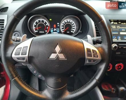 Красный Мицубиси Аутлендер, объемом двигателя 2.36 л и пробегом 93 тыс. км за 11499 $, фото 30 на Automoto.ua