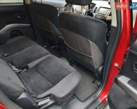 Красный Мицубиси Аутлендер, объемом двигателя 2.36 л и пробегом 93 тыс. км за 11499 $, фото 23 на Automoto.ua