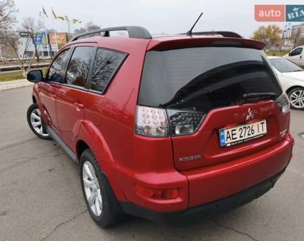 Красный Мицубиси Аутлендер, объемом двигателя 2.36 л и пробегом 93 тыс. км за 11499 $, фото 9 на Automoto.ua