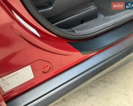 Червоний Міцубісі Аутлендер, об'ємом двигуна 2 л та пробігом 96 тис. км за 10950 $, фото 30 на Automoto.ua