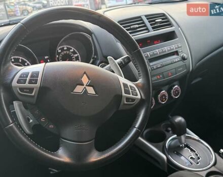 Червоний Міцубісі Аутлендер, об'ємом двигуна 2 л та пробігом 96 тис. км за 10950 $, фото 31 на Automoto.ua