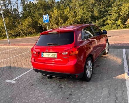 Красный Мицубиси Аутлендер, объемом двигателя 2 л и пробегом 200 тыс. км за 9100 $, фото 4 на Automoto.ua