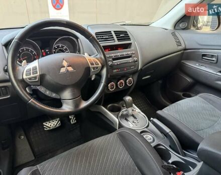 Червоний Міцубісі Аутлендер, об'ємом двигуна 2 л та пробігом 96 тис. км за 10950 $, фото 22 на Automoto.ua