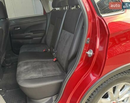 Червоний Міцубісі Аутлендер, об'ємом двигуна 2 л та пробігом 96 тис. км за 10950 $, фото 24 на Automoto.ua