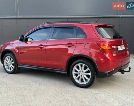 Червоний Міцубісі Аутлендер, об'ємом двигуна 2 л та пробігом 96 тис. км за 10950 $, фото 50 на Automoto.ua