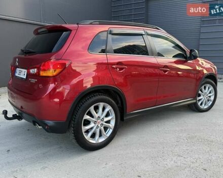 Червоний Міцубісі Аутлендер, об'ємом двигуна 2 л та пробігом 96 тис. км за 10950 $, фото 7 на Automoto.ua