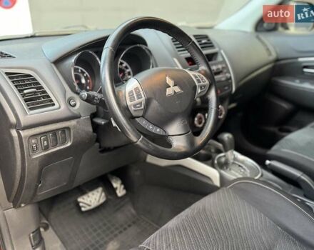 Червоний Міцубісі Аутлендер, об'ємом двигуна 2 л та пробігом 96 тис. км за 10950 $, фото 26 на Automoto.ua