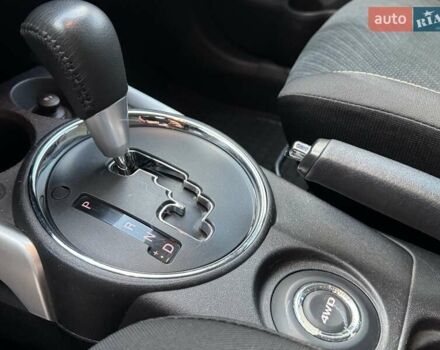 Червоний Міцубісі Аутлендер, об'ємом двигуна 2 л та пробігом 96 тис. км за 10950 $, фото 16 на Automoto.ua