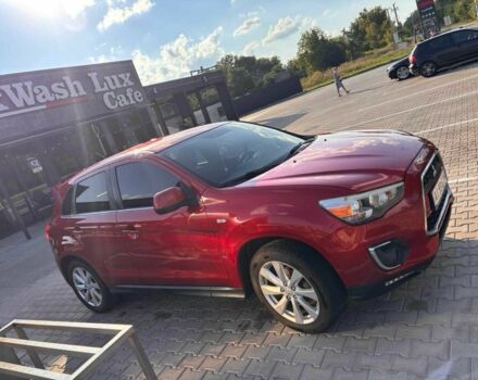 Красный Мицубиси Аутлендер, объемом двигателя 2 л и пробегом 200 тыс. км за 9100 $, фото 8 на Automoto.ua